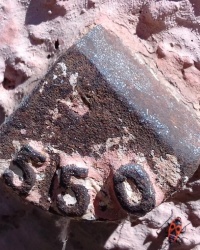 Репер № 550 на ул. Центральная, 33, пос. Шевченково
