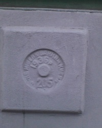 Нивелирная марка (205) 1936 года, ул. М. Грушевского, 30
