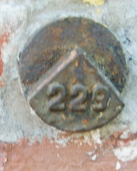 Репер 229 на пр. Ленина 81 в Запорожье